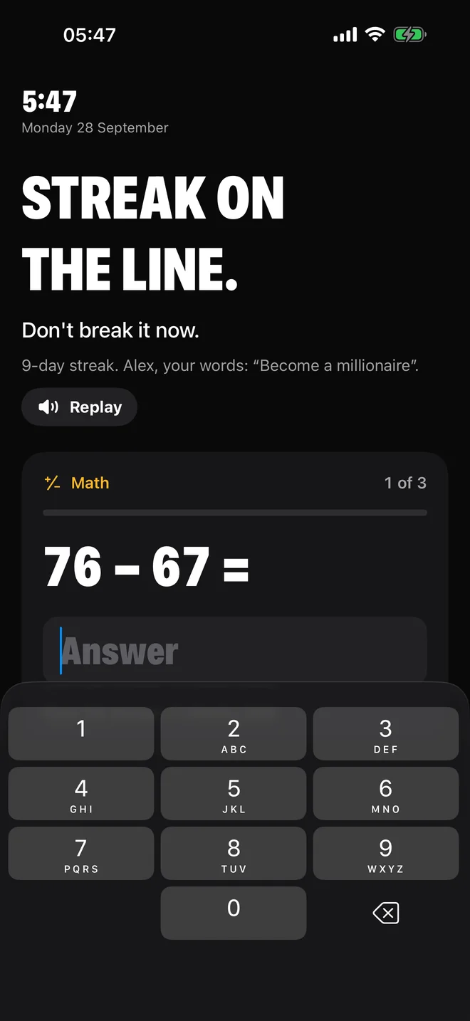 The Zero Dark wake screen: the coach's line in large type, the user's goal underneath, and sums to solve.